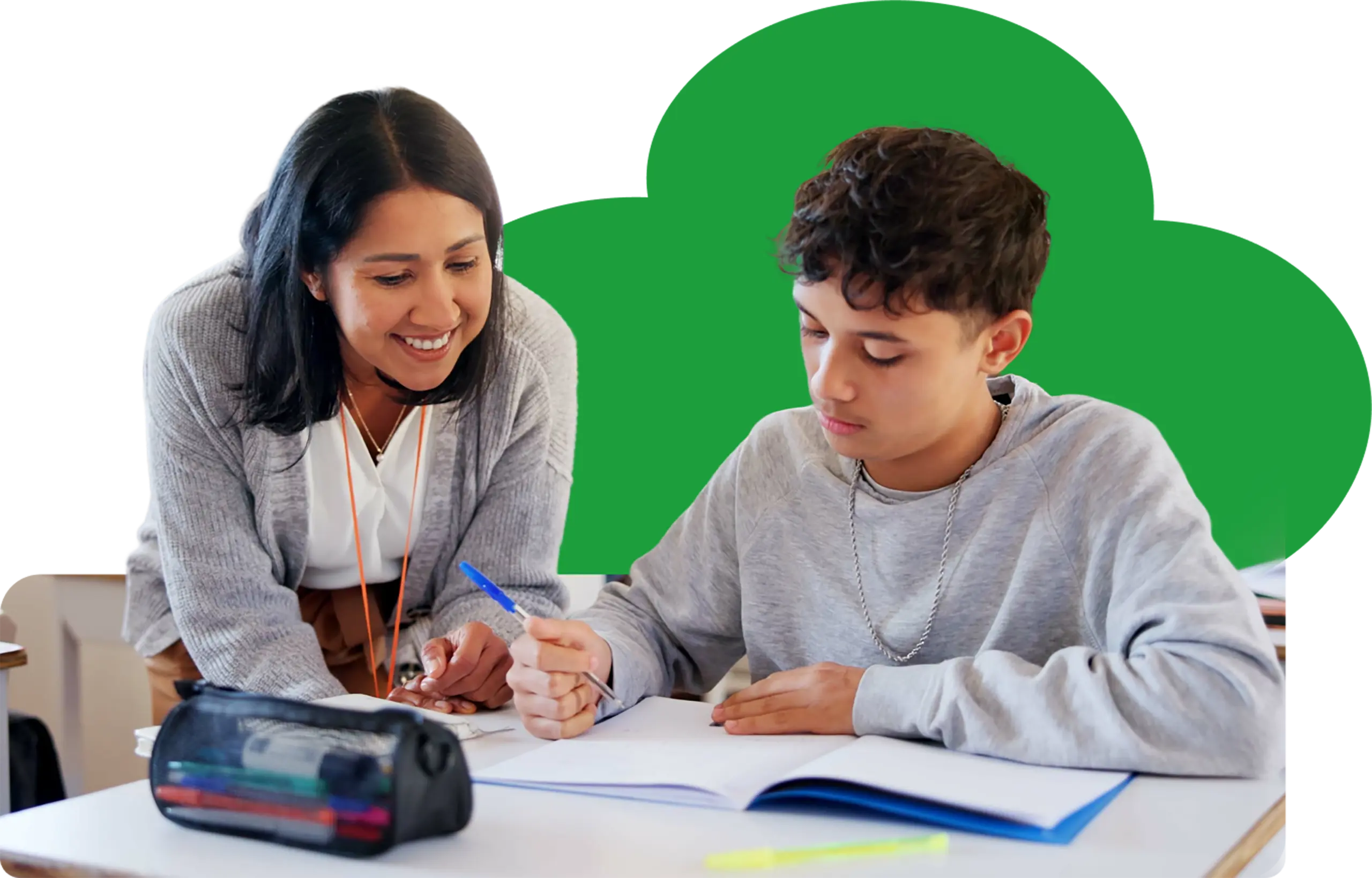 teacher helping student with coursework